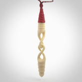 A handcarved masterpiece. A complex large twist pendant carved from bone by Yuri Terenyi for NZ Pacific. This is a true piece of wearable art which is collectible. A one-off masterpiece and quite unique.